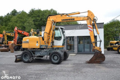 Excavadora Liebherr A 312 excavadora de ruedas usada