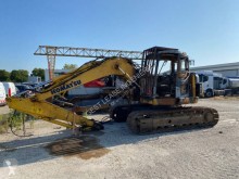 Komatsu PC 138 US excavator pe şenile accidentată