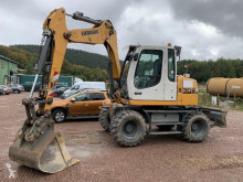 Liebherr A309 Litronic pelle sur pneus occasion