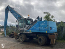 Fuchs MHL 350 pelle de manutention occasion