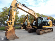 Caterpillar 320E pásová lopata použitý