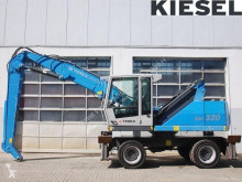 Excavadora Fuchs MHL320 D excavadora de manutención usada
