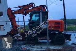 Hitachi ZX140W-3 pelle sur pneus occasion