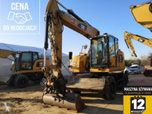 Caterpillar excavator pe roti second-hand