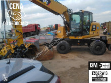 Колесен багер Caterpillar