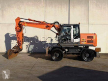 Hitachi ZX140W-3 pelle sur pneus occasion