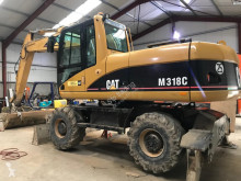 Caterpillar M318C pelle sur pneus occasion