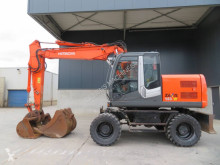 Hitachi ZX 140 W-3 használt gumiabroncsos kotrógép