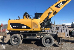 Caterpillar M318D MH přidržovací lopata použitý