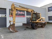 Caterpillar M315 excavator pe roti second-hand