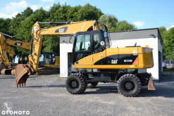 Pelle sur pneus Caterpillar M316D
