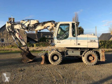 Liebherr A314 Litronic pelle sur pneus occasion