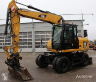 Caterpillar M313D pelle sur pneus occasion