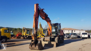 Hitachi ZX130W pelle sur pneus occasion