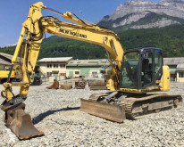 New Holland E140 használt lánctalpas kotrógép