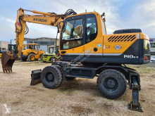 Hyundai R140 W-9 használt gumiabroncsos kotrógép