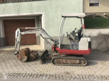 Escavadora Takeuchi usada