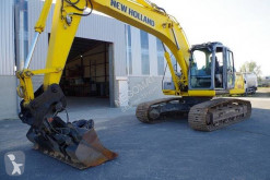 New Holland E 215 B Pelle 22 tonnes KOBELCO excavator pe şenile second-hand
