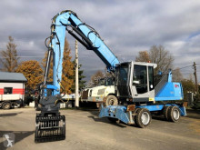 Fuchs MHL 320 excavator pe roti second-hand