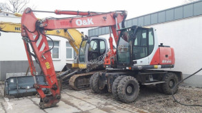 Экскаватор колёсный O&K MH Plus