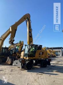 Caterpillar wheel excavator MH3022