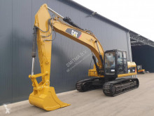 Caterpillar 323DL tweedehands rupsgraafmachine