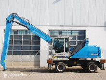 Fuchs MHL335 E pelle de manutention occasion