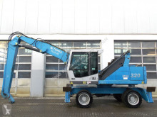 Fuchs MHL320 excavator pentru manipulare second-hand