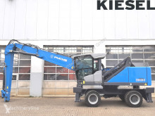 Fuchs MHL331 F excavator pentru manipulare second-hand
