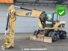 Caterpillar M316 excavator pe roti second-hand