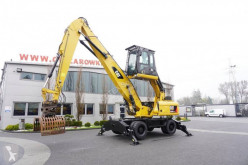 Caterpillar M322D MH 22t , material handler , 9k mth , rotator , grapple pelle de manutention occasion
