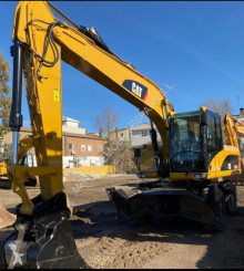Excavadora Caterpillar M318D(1047)(FD) excavadora de ruedas usada