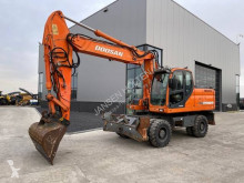 Excavadora Doosan DX 210 W excavadora de ruedas usada