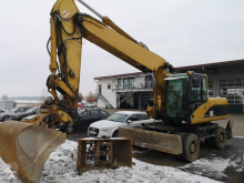Caterpillar CAT M 322 C escavadora de rodas usada