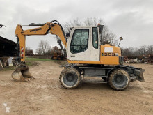 Liebherr A309 Litronic pelle sur pneus occasion