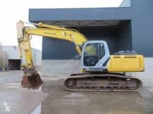 New Holland E 215 B excavator pe şenile second-hand