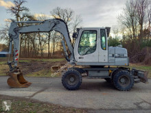 Pelle sur pneus Liebherr A 311 Litronic