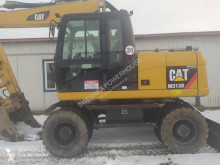 Caterpillar M313D pelle sur pneus occasion