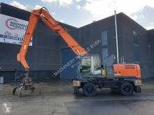 Pelle sur pneus Hitachi ZX250