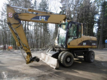 Caterpillar M318C pelle sur pneus occasion