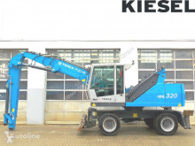 Excavadora Fuchs MHL320 D excavadora de manutención usada