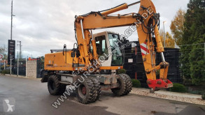 Excavadora Liebherr 904 Litronic mit MS10 excavadora de ruedas usada