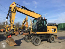 Caterpillar M318D pelle sur pneus occasion