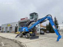 Excavadora Fuchs MHL 320 excavadora de manutención usada