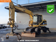 Pelle sur pneus Caterpillar M312