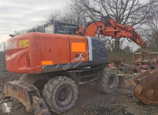 Pelle sur pneus Hitachi ZX140W-3