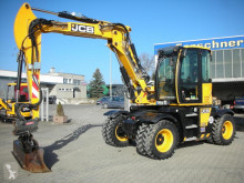 Excavadora JCB Hydradig Hydradig JS110W - 40 km/h mit Oilquick OQ45-5 usada