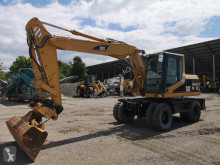 Caterpillar CAT M 312 koparka kołowa używana