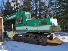 Caterpillar 219 Kettenbagger mit Patu 655 Prozessor pelle sur chenilles occasion