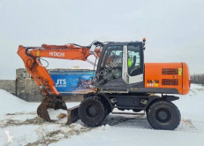 Pelle sur pneus Hitachi ZX140W-3